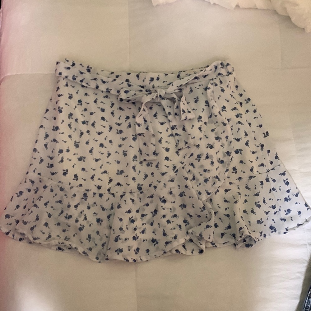 White ruffle mini skirt